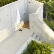 view of outdoor shower at this contemporary tree architecture, backyard, grass, yard, white, brown