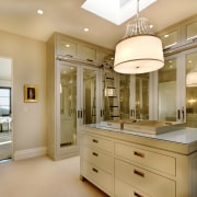 View of dressing room that features cupboards with cabinetry, ceiling, countertop, cuisine classique, home, interior design, kitchen, room, orange, brown