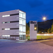 View of a logistics centre designed by Cymon apartment, architecture, building, commercial building, condominium, corporate headquarters, elevation, facade, headquarters, home, house, lighting, metropolitan area, mixed use, neighbourhood, night, property, real estate, residential area, sky, blue