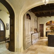 View of traditionally styled kitchen with Tudor-style arch, arch, ceiling, estate, floor, flooring, interior design, property, real estate, brown, orange