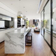 Glazed walls. Wood floors and decking. Island calacatta countertop, house, interior design, kitchen, real estate, gray