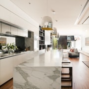 Glazed walls. Wood floors and decking. Island calacatta apartment, architecture, countertop, home, house, interior design, kitchen, living room, real estate, white