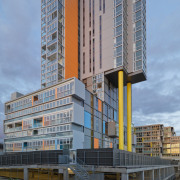 Exterior view of the Altitude in the Precinct apartment, architecture, building, city, commercial building, condominium, corporate headquarters, daytime, facade, headquarters, metropolis, metropolitan area, mixed use, neighbourhood, real estate, residential area, sky, skyscraper, tower block, urban area, teal, gray