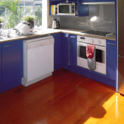 View of the contemporary kitchen - View of countertop, floor, flooring, hardwood, interior design, kitchen, laminate flooring, real estate, room, wood flooring, gray, red