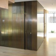 View of brass walls fabricated by Craft Metals door, floor, flooring, glass, hardwood, interior design, property, real estate, wall, wood, wood flooring, brown, white