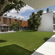 Exterior view of home with timber louvres, grassed architecture, backyard, courtyard, estate, facade, grass, home, house, lawn, plant, property, real estate, residential area, villa, yard, brown