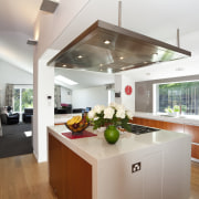 View of kitchen which features oak floors, kitchen countertop, cuisine classique, interior design, kitchen, real estate, gray, brown