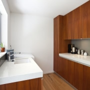 View of kitchen which features oak floors, CaesarStone architecture, bathroom, countertop, floor, flooring, hardwood, house, interior design, kitchen, real estate, room, sink, wood, wood flooring, white, brown