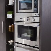 View of a kitchen which features DCS oven gas stove, home appliance, kitchen, kitchen appliance, kitchen stove, major appliance, microwave oven, oven, gray, black