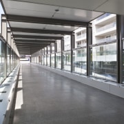 View of the corridor at the upgraded Newmarket airport terminal, building, daylighting, metropolitan area, public transport, structure, gray, white