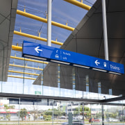 View of the renovated New Lynn Railway Station airport terminal, architecture, building, corporate headquarters, daytime, infrastructure, metropolitan area, sky, structure, urban area, blue