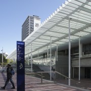 View of Aotea Square which features paving, planters, architecture, building, commercial building, condominium, convention center, corporate headquarters, daylighting, daytime, facade, headquarters, metropolis, metropolitan area, mixed use, neighbourhood, residential area, structure, urban design, walkway, gray