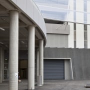 View of concrete pedestrian bridge at Eden Park architecture, building, daytime, facade, metropolitan area, structure, gray, white