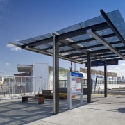 Specialist architectural glazing company Glass Projects supplied and bus stop, gray, blue