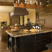 View of kitchen with barrel ceiling, light cabinets cabinetry, countertop, cuisine classique, flooring, hardwood, interior design, kitchen, room, brown
