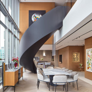 The sculptural steel stair is both a focal 