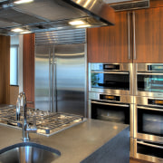 View of contemporary kitchen and dining area with ceiling, countertop, interior design, kitchen, gray, brown