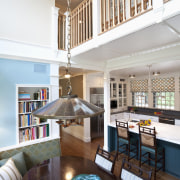 View of kitchen with dark turquoise island, colorful ceiling, daylighting, estate, home, interior design, living room, lobby, loft, real estate, room, white
