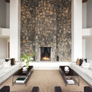 View of symmetrical living area with twin sofas ceiling, fireplace, floor, flooring, hearth, interior design, living room, room, wall, white, brown