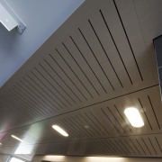 Interior view of the Poshe Centre which features architecture, ceiling, daylighting, daytime, light, lighting, line, product design, black, gray