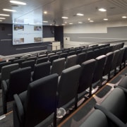 Interior view of the Poche Centre which features auditorium, conference hall, black, gray