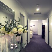 View of hallway at this David Reid show ceiling, floristry, flower, home, interior design, real estate, gray