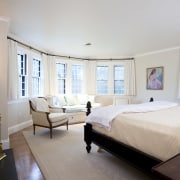 View of bedroom with a bed, chairs and bedroom, ceiling, estate, home, hotel, interior design, property, real estate, room, suite, window, gray