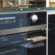 View of kitchen which features Smeg oven. - black