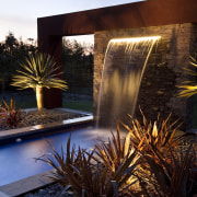 View of pool and patio area, with water arecales, landscape lighting, lighting, palm tree, reflecting pool, reflection, water, water feature, black