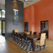 View of a dining room which features wall ceiling, chair, dining room, floor, flooring, furniture, interior design, living room, lobby, real estate, room, table, wall, brown