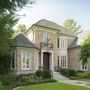 VIew of home built to reflect the style building, cottage, elevation, estate, facade, farmhouse, historic house, home, house, manor house, mansion, neighbourhood, property, real estate, residential area, siding, suburb, window, white, green