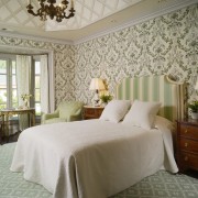 VIew of home built to reflect the style bed frame, bedding, bedroom, ceiling, curtain, estate, home, interior design, real estate, room, suite, textile, wall, window, window covering, window treatment, gray