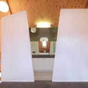 View of bathroom suite with angled openings - architecture, ceiling, daylighting, floor, home, house, interior design, property, real estate, room, wall, wood, white, orange