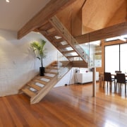 View of bathroom suite with angled openings - architecture, ceiling, daylighting, floor, flooring, hardwood, home, house, interior design, laminate flooring, living room, loft, real estate, stairs, wood, wood flooring, brown
