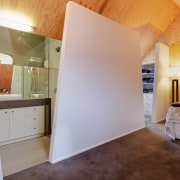 View of bathroom suite with angled openings - architecture, cabinetry, ceiling, daylighting, floor, flooring, hardwood, home, house, interior design, laminate flooring, loft, real estate, room, wall, wood, wood flooring, gray, orange