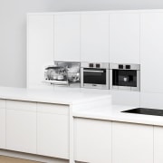 View of a minimal kitchen which features white furniture, kitchen, product, product design, white