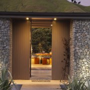 View of rural home with open plan lounge door, estate, facade, home, house, outdoor structure, real estate, siding, brown