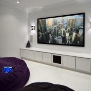 View of the Tran Residence which features home display device, electronic device, interior design, multimedia, room, technology, gray