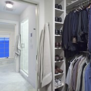 View of home with Tudor-style elements, wood fireplace closet, floor, home, interior design, room, gray