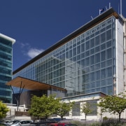 View of the Christchurch City Council building, with apartment, architecture, building, city, commercial building, condominium, corporate headquarters, daytime, facade, headquarters, hotel, metropolis, metropolitan area, mixed use, real estate, sky, tower block, blue