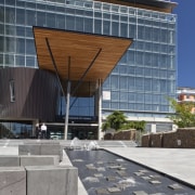 View of the Christchurch City Council building, with architecture, building, commercial building, condominium, corporate headquarters, daylighting, facade, headquarters, real estate, roof, gray