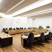 View of the Christchurch City Council building, with ceiling, conference hall, interior design, office, table, white, orange