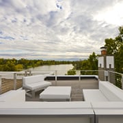 View of a multi-storey grey house with swimming condominium, home, house, property, real estate, roof, white