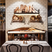 View of themed Sydney restaurant. - View of furniture, interior design, table, wall, black, white