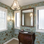 View of bathroom with floral wallpaper and dark-toned bathroom, ceiling, estate, floor, furniture, home, interior design, room, wall, window, gray