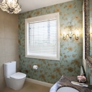 View of bathroom with floral wallpaper and dark-toned bathroom, ceramic, floor, home, house, interior design, plumbing fixture, room, sink, tile, wall, window, gray