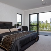 View of Platinum Homes show home with solid bed frame, bedroom, ceiling, estate, home, interior design, property, real estate, room, window, gray, black