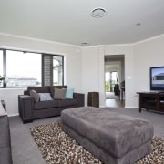 View of Platinum Homes show home with solid home, interior design, living room, property, real estate, room, gray