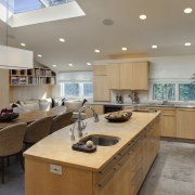 View of kitchen with wooden cabinetry and island, ceiling, countertop, interior design, kitchen, real estate, gray