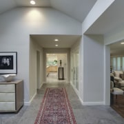 View of hallway with white walls and red ceiling, estate, floor, flooring, home, interior design, living room, real estate, room, gray